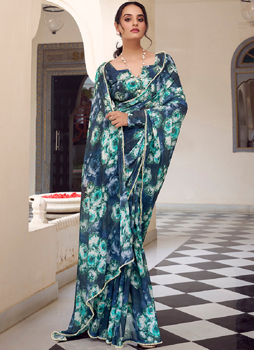 Beautiful Printed Marble georgette saree with a elegant pearl border.